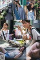 A collage of photos of a woman eating a sandwich.